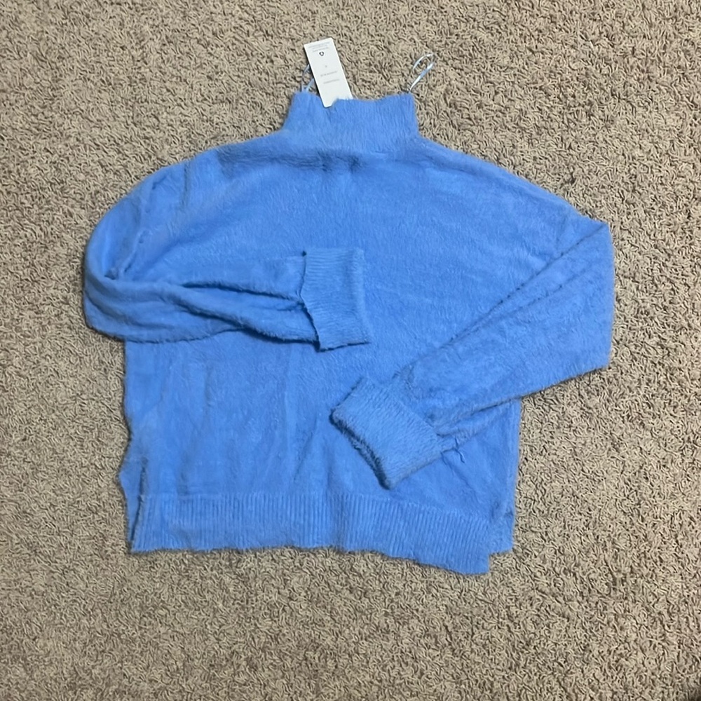 blue sweater